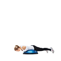 Image showing Woman, bosu ball and lying in balance for exercise, workout or fitness on a white studio background. Young active female person or athlete on half round object for health and wellness on mockup space