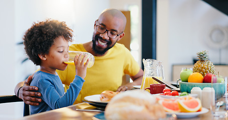 Image showing Black family, juice and father with child for breakfast, lunch and eating together in home. Happy, parents and dad and boy at table for bonding with meal for health, nutrition and hunger in house