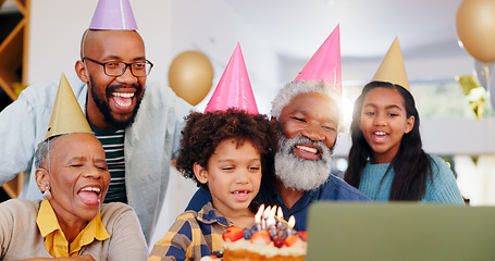 Image showing Cake, video call and family at birthday party celebration together at modern house with candles. Happy, laptop and young children with African father and grandparents for sweet dessert at home.
