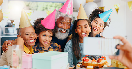 Image showing Happy birthday, phone and family in celebration for memory or picture together at home. Excited people or group smile for photography, capture or social media while bonding at party or event at house