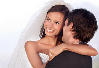 Image showing Love, happy and bride with groom at wedding for commitment and trust with celebration outdoor. Marriage, loyalty and people at ceremony for marriage, event and couple hug with smile at reception