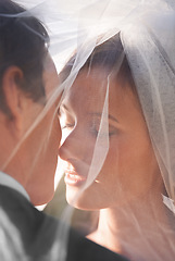 Image showing Kiss, veil and couple at wedding with sunshine, love and commitment at outdoor reception. Romance, face of man and woman at marriage celebration in happiness, loyalty and future partnership together.