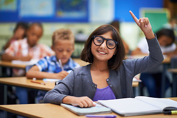 Image showing Girl, portrait and raise hand in class, elementary school and answer teacher question. Students, study and childhood development for education, knowledge and academic information for people