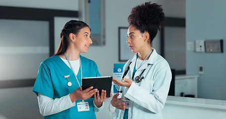 Image showing Teamwork, discussion and doctors on tablet in hospital for research, report advice and telehealth. Healthcare, clinic and women talking on digital tech for medical service, online results and meeting