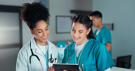 Image showing Teamwork, discussion and doctors on tablet online in hospital for research, report advice and telehealth. Healthcare, clinic and women talking on digital tech for medical service, results and meeting