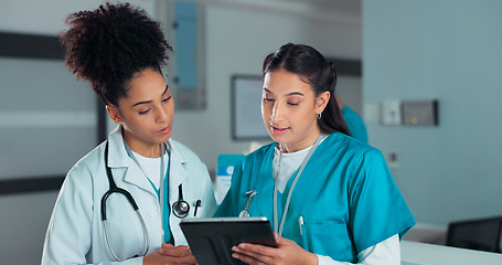 Image showing Teamwork, meeting and doctors on tablet online in hospital for research, report advice and telehealth. Healthcare, clinic and women talking on digital tech for medical service, results and discussion