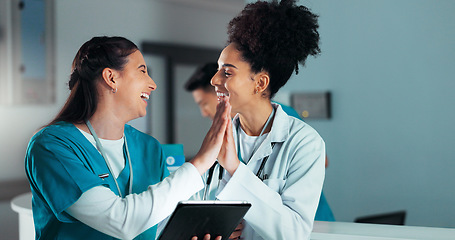 Image showing Teamwork, high five and doctors on tablet in hospital for research success, report advice and telehealth. Healthcare, clinic and women talking on digital tech for medical service, results and meeting