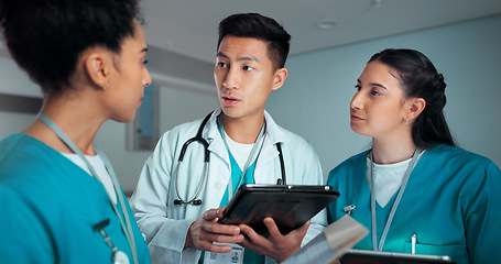 Image showing Consulting, discussion and doctors on tablet in hospital for research, diagnosis advice and telehealth. Healthcare, clinic and people talking on digital tech for medical service, results and meeting