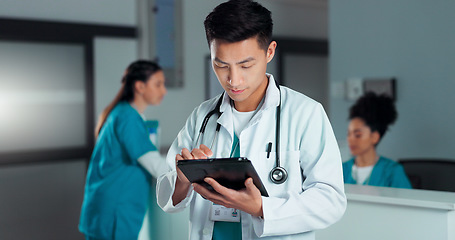 Image showing Tablet, healthcare doctor and happy man typing online research, check medicine study and smile for wellness results. Hospital service, happiness and surgeon reading clinic review, feedback or news