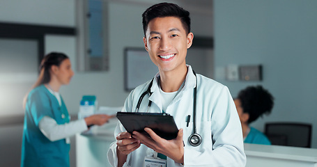 Image showing Tablet, healthcare doctor and happy Asian man with online research, medicine study and wellness test results. Hospital web info, portrait and nurse with job experience, career smile and confidence