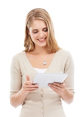 Image showing Happy woman, reading and tablet in studio with social networking, online blog and app with white background. News, email and digital scroll with information for web search, media and internet article