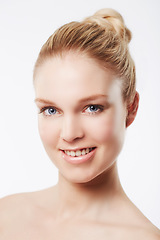 Image showing Portrait of happy model, face or skincare for wellness with cosmetics, aesthetic or healthy glow. Dermatology, studio or confident woman with pride, smile or smooth beauty results on white background