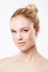 Image showing Portrait of model, natural or skincare for wellness with cosmetics, aesthetic or healthy glow. Dermatology, studio or confident female person with pride, shine or beauty results on white background