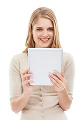 Image showing Woman, portrait and smile with tablet in studio to scroll website, update social media post and search blog on white background. Happy model, digital technology and online shopping to download ebook