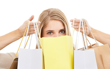 Image showing Shopping bag, face and woman in portrait, retail and fashion with customer in studio and sale on white background. Discount at store, gift and choice with commercial, eyes and product from market