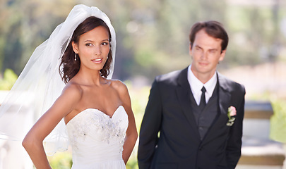 Image showing Couple, happy and love on wedding day in outdoors, together and excited for marriage and commitment. People, romance and union at outside ceremony, loyalty and pride for fashion and partnership