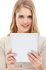 Image showing Woman, portrait and smile with tablet in studio for online shopping, download ebook subscription or update social media post on white background. Happy model, digital tech or scroll internet for blog