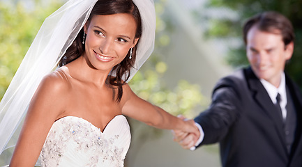 Image showing Couple, romance and playful on wedding ceremony for love celebration, support and together for marriage. Happy people, partnership and smiling for commitment, loyalty and union or devotion in outdoor