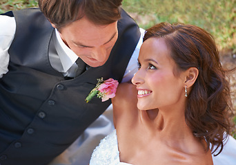 Image showing Couple, romance and love on wedding day in outdoors, together and excited for marriage and commitment. Happy people, smile and union or relaxing on grass, loyalty and pride for partnership at event