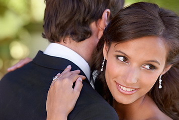 Image showing Couple, happy and embrace on wedding day for love, support and together for marriage and commitment. People, romance and hugging at outside ceremony, loyalty and smiling for devotion in outdoors