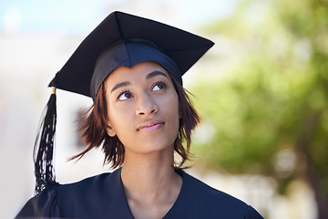 Image showing University graduation, woman and thinking outdoor of education, future goals and studying for opportunity. College graduate dream in park of award, certified achievement or scholarship for knowledge