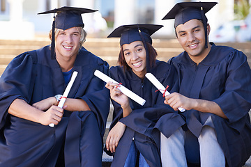 Image showing Graduation, portrait and students on steps with certificate at university campus with smile, diversity and education. School, success and happy group of friends with diploma for academic achievement.