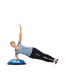 Image showing Woman, portrait and lying on bosu ball for exercise, workout or training on a white studio background. Active female person on half round object for pilates, practice or strong core on mockup space