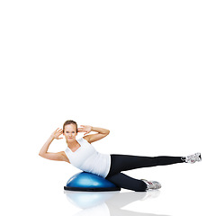 Image showing Portrait of athlete, ball or core exercise in workout for abs or core development on white background. Woman, training equipment or fitness for studio mockup space, balance challenge or wellness