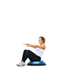 Image showing Woman, fitness and sitting on balance ball for exercise, workout or training on a white studio background. Active person on half round object for pilates, practice or strong core on mockup space