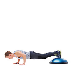Image showing Fitness, half ball and man doing push up for wellness, studio workout or arm strength development. Gym mockup space, exercise equipment and person training muscle on white background floor