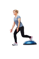 Image showing Exercise, half ball and woman doing lunge for wellness, studio workout or legs strength performance. Gym commitment, balance dome platform and person in stability training routine on white background