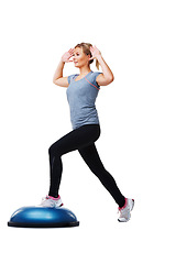 Image showing Studio, half ball and woman training for gym commitment, physical exercise or aerobics performance. Fitness club, balance platform and pilates person in muscle stability workout on white background