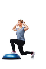 Image showing Training, half ball and fitness woman doing lunge for coordination, exercise or balance performance activity. Muscle fitness, dome platform and studio person in stability workout on white background