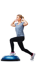 Image showing Fitness, half balance ball and woman doing lunge for wellness, studio workout or legs strength performance. Gym commitment, training equipment and person in exercise routine on white background