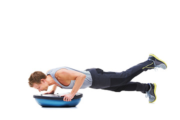 Image showing Man, half ball and exercise or workout in studio, core strength and fitness challenge for wellness. Male person, athlete and equipment for training, mockup space and performance by white background