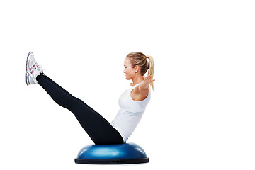 Image showing Sports, half ball and woman athlete in studio for stretching body workout or training with balance. Sports, equipment and young female person with muscle warm up exercise isolated by white background