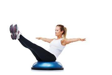 Image showing Health, half ball and woman in a studio for stretching body workout or training with balance. Fitness, equipment and young female person with muscle warm up exercise isolated by white background.