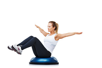 Image showing Fitness, half ball and young woman in a studio for stretching body workout or training with balance. Sports, equipment and female person with muscle warm up exercise isolated by white background.