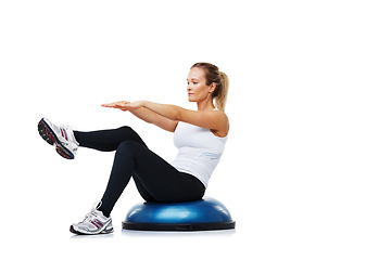 Image showing Fitness, half ball and woman in a studio for stretching body workout or training with balance. Sports, equipment and young female person with muscle warm up exercise isolated by white background.