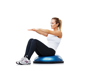 Image showing Health, half ball and young woman in a studio for stretching body workout or training with balance. Sports, equipment and young female person with muscle warm up exercise isolated by white background