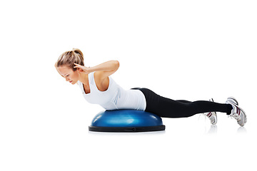 Image showing Fitness, half ball and woman in a studio for stretching body workout or training with balance. Sports, equipment and young female person with muscle warm up exercise isolated by white background.