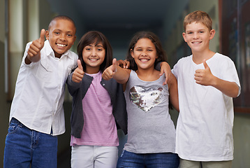 Image showing Happy children, portrait and students with thumbs up for success, winning or education at school. Group of young kids smile with like emoji, yes sign or OK for thank you or good job outside classroom