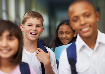 Image showing Friends, portrait and happy in corridor of school with backpack for learning, education and knowledge. Student, person and face with smile in building before class or ready to study with diversity