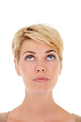 Image showing Woman, face and thinking for decision, idea or question on a white studio background. Closeup of female person, model or blonde looking up in wonder or thought for selection or alert on mockup space