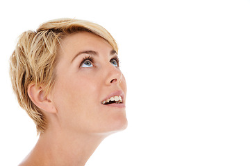 Image showing Woman, face and looking up on mockup space for news, notification or alert on a white studio background. Closeup of young female person, model or blonde smile in wonder, thinking or sight for vision