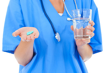 Image showing Hands, glass of water and pills, nurse and healthcare in studio, supplements or vitamins on white background. Health, wellness and medical treatment, person with medication or pharmaceutical drugs