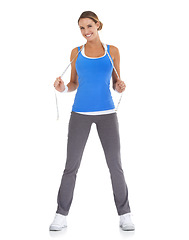 Image showing Fitness, measuring tape and portrait of woman in a studio for exercise, training or workout. Sports, smile and young happy female person with equipment for weight loss isolated by white background.