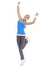 Image showing Woman, workout celebration and yes in studio for exercise, fitness achievement and body goals or dance. Sports model with fist, energy or surprise portrait for training results on a white background