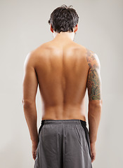 Image showing Back, shirtless or athlete for fitness results, wellness and health isolated on grey background in studio. Muscle, sports man or model with progress in exercise, workout or training on backdrop alone