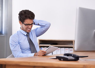 Image showing Business man, stress and writing in notebook, contemplating ideas and notes in workplace. Male professional, frustrated and planning for schedule or strategy, mental health and journal or info